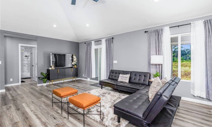Keaau House | Serene Sky Blue Lounge: Unwind in Comfort & Style