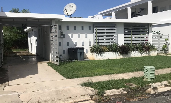 Isla Verde House | Short walk to beach, and 3 minutes from Airport