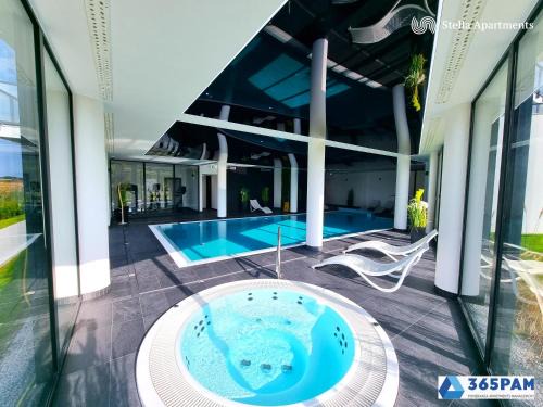 Kolobrzeg Apartment | Silver Westin House - BASEN, JACUZZI, SAUNA, SIŁOWNIA, PLAC ZABAW W CENIE - 365PAM