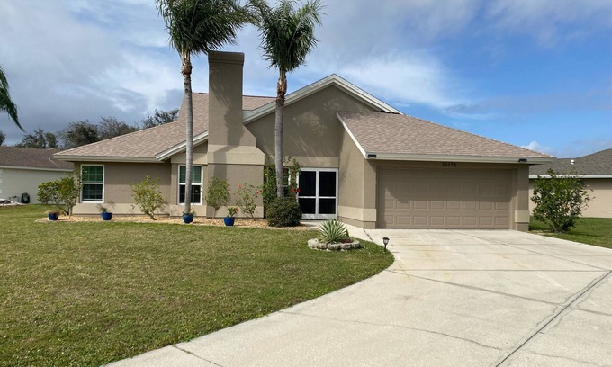 Deep Creek House | Single family, 4 bedroom, 2.5 bath, 2 car garage, lanai w/pool, outdoor shower.