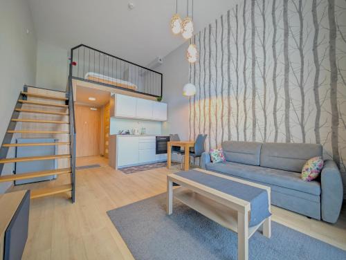 Fabryczna Apartment | Sky Loft Wrocław Apartment by BookingHost