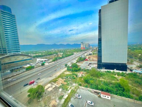 Blue Area Apartment | Skyline Luxury Apartments-Elysium Tower Opposite Centaurs Mall Islamabad