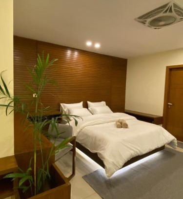 Islamabad Apartment | Skyluxe Designer Studio with rooftop Pool & Self Check In