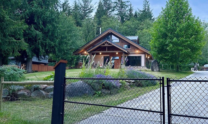 Mansons Landing Ski Chalet | "Sleeps 15: Dog-Friendly Rustic Haven on Cortes Island" Large grass yard