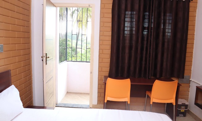 Tumkur Hotel | Smilestay Shree Jayaganga Arcade