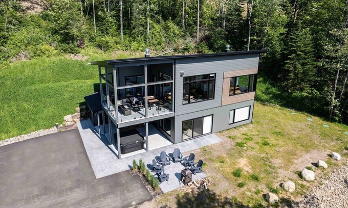 Les Eboulements Ski Chalet | Solstice 203: Luxury Living, Riverfront Serenity