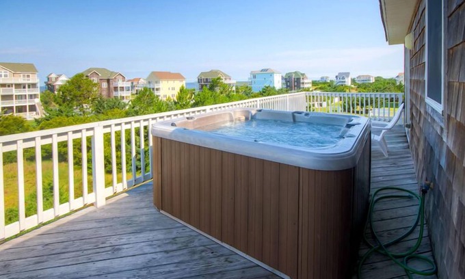 Wind Over Waves House | Soundside Dog Friendly Home with Pool, Hot Tub, Cmty Boat Ramp, and Game Room