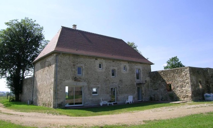 Chirat-l'Eglise Cottage | Spacious cottage with garden, terrace, BBQ and fireplace