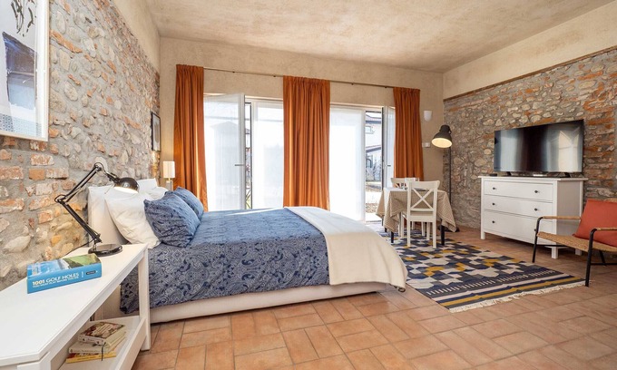 Cressa Apartment | Spacious Studio Apartment with Garden in Restored Farmhouse