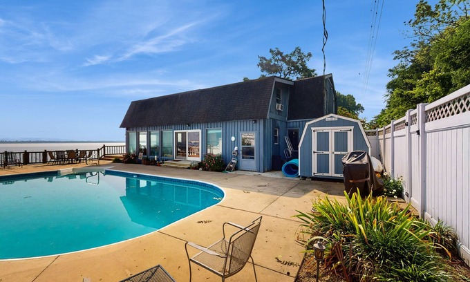 Avoca House | Spacious waterfront house with private heated seasonal pool + dock