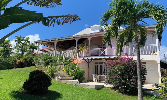 Capesterre-Belle-Eau Apartment | Studio South East, large terrace facing the sea in tropical garden.
