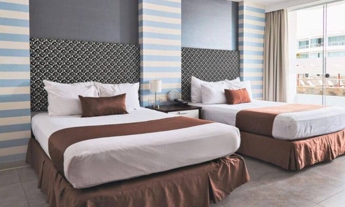Asia House | Suite Matrimonial King and living Room at VPX Hotel