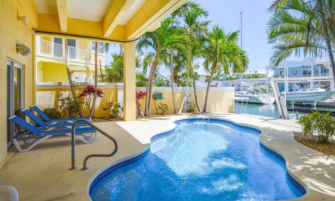Summerland Key House | Summerland Airport Hangar Home with Pool, Private Runway and deep wide Canal