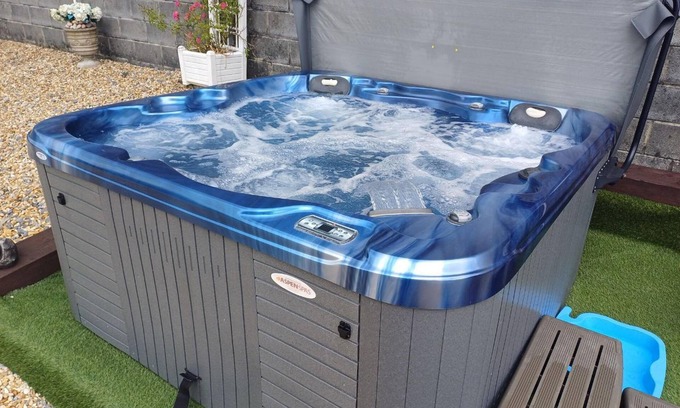 Llangynog Cottage | Sunny Bank, Countryside accessible cottage with hot tub and grassy lawn area