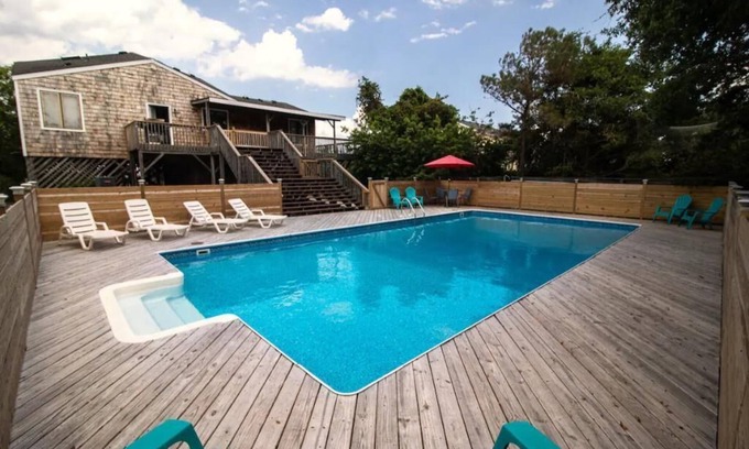 Sea Scape Cottage | Sunny with a chance of Golfballs
