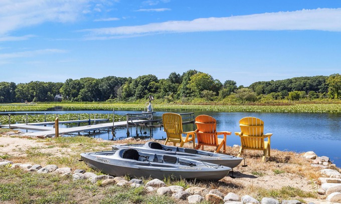 La Porte House | Sunset Shores - Lakefront Home with Hot Tub and Fire Pit