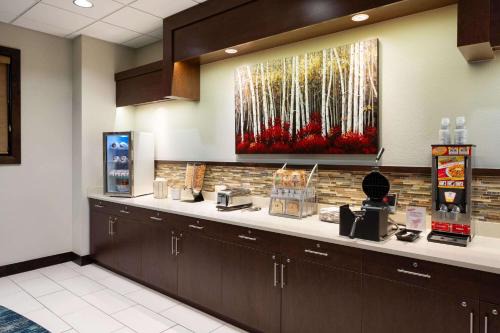 Conrad Hotel | Super 8 by Wyndham Conrad