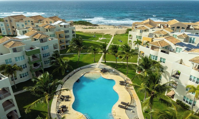 Bajura Condo | SurfSunSerenity Spacious Beachfront Penthouse Roof Top Terrace 3BD3BA Jobos!