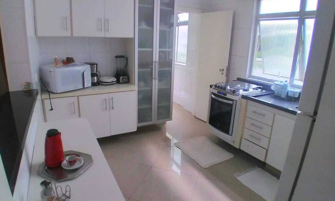 Jardim Praiano Apartment | Sweet Home Guarujá