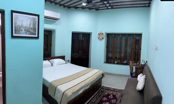 Kalighat House | Teakwood Suite - Nokha House