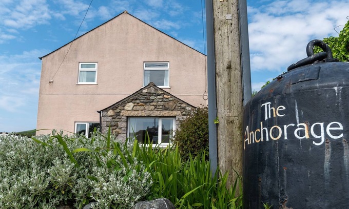 Llanddeusant Apartment | The Anchorage is a spacious 4-bedroom holiday cottage in Church Bay