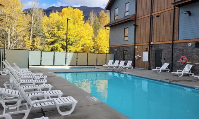 Dead Man's Flats Apartment | The Emerald Mountain Getaway w/Pool, hot tub and fitness room.