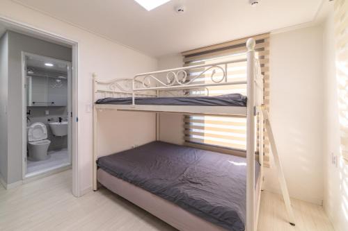 Seomyeon House | The house has 4 bedrooms and 3 bathrooms.