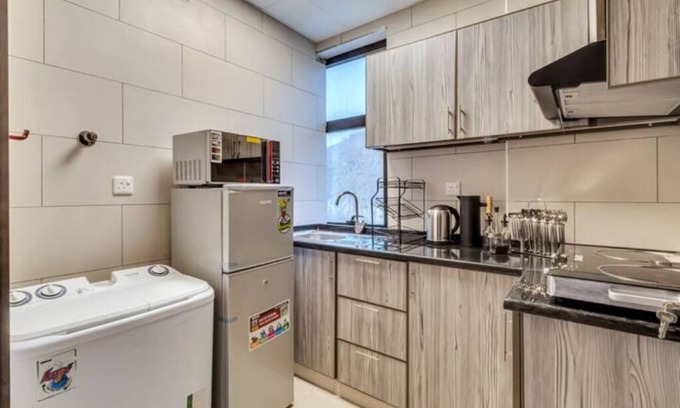 Falaj al Moalla Apartment | The Living