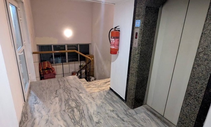 Madurai Apartment | The Madurai lounge-over looking Meenakshi temple. top floor of hotel Padmam