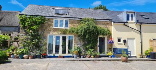 Corscombe House | The Old Milking Parlour at Knapp Farm