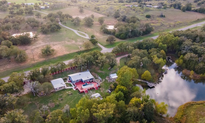 Prairie Lea House | The Outdoor Oasis Pool with No Heat/Fire Pit/Ponds