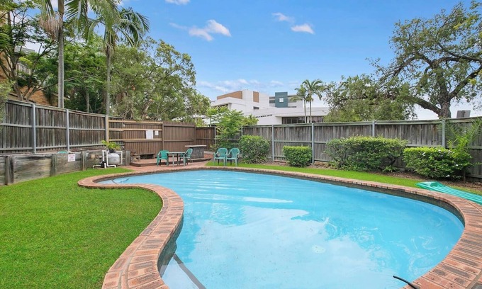 Auchenflower Apartment | The Poolside Perch A Breezy Balcony Gem