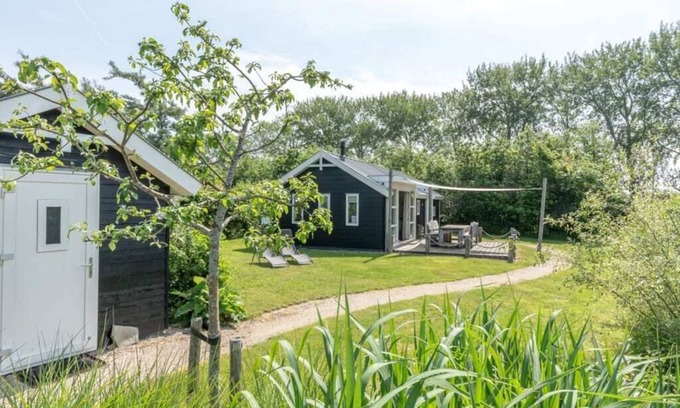 Westenschouwen House | This chalet is equipped with a gas fireplace and infrared sauna.