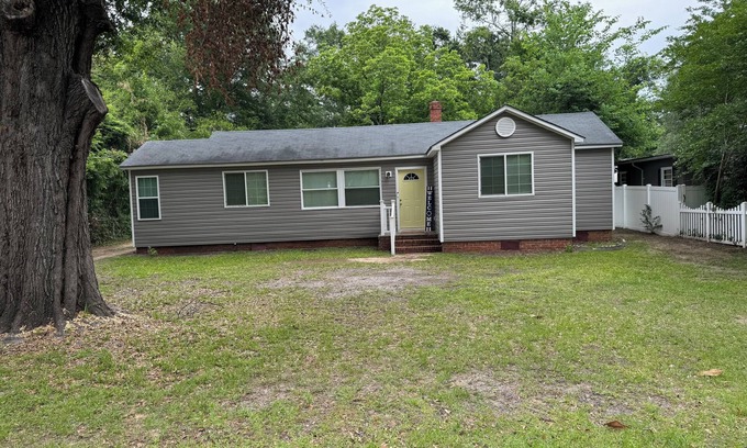 Sumter House | This charming 2-bed, 1-bath house offers a warm sanctuary for those on the go.