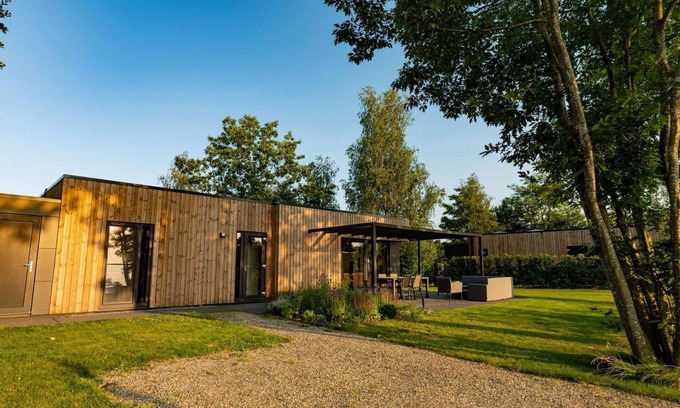 Kotten House | This holiday home for 6 people has a spacious living room with an open kitchen, three bedrooms, and a spacious terrace.