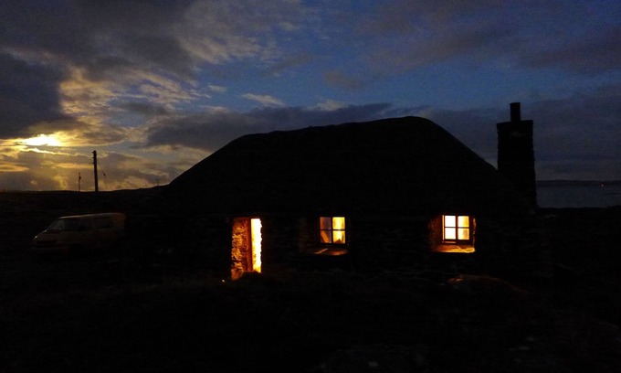 Outer Hebrides Cottage | Traditional stone and thatch cottage on the waters edge with beautiful sea views
