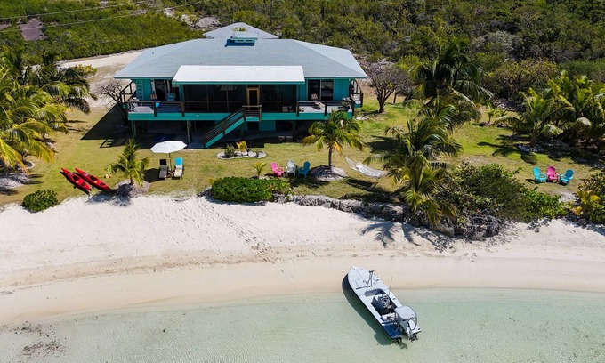 Mangrove Cay Villa | Tranquil 4 bedroom Beachside Villa: Ultimate Privacy & Comfort.