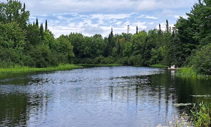 Ryerson Cottage | Tranquil, airy cottage just steps from the river with miles of boating fun!