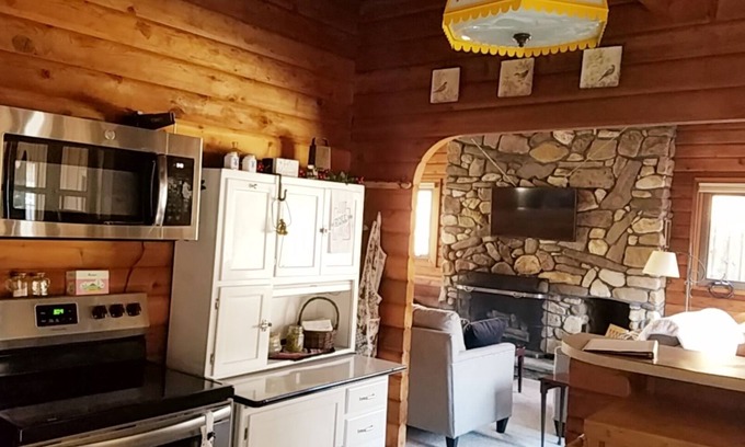 Lost River Cottage | Tree swing, Outdoor dining with Stream and Fire Pit, Large Yard, Sunroom, Trail