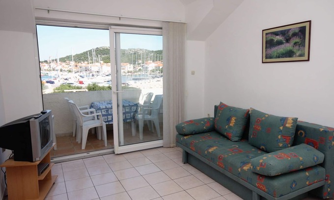 Jezera Apartment | Two bedroom apartment with balcony and sea view Jezera, Murter (A-9502-c)