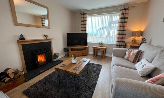 Caergeiliog House | Two bedroom house with enclosed gardens and 2 car drive
