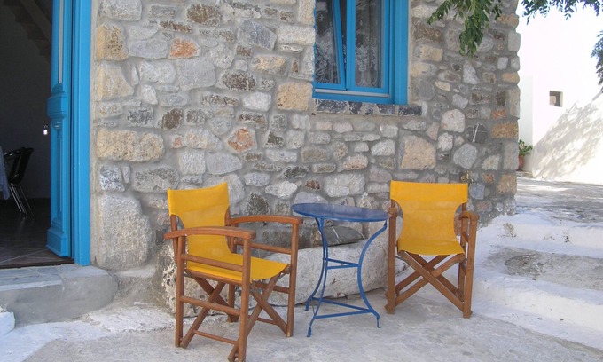Astypalaia House | Two storey stone built house by the castle