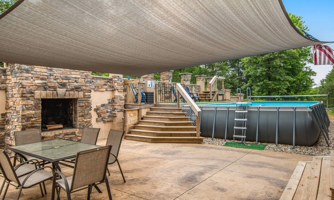 Rome House | Two-story, dog-friendly home with a pool, indoor/outdoor fireplaces, & AC