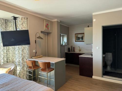 Lahti Apartment | Tyylikäs maisema-asunto asemalla