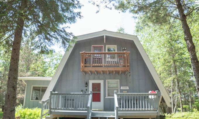 Bigfork Cabin | Unique modified A-frame cabin with loft, sandy lakefront, and amenities of home.