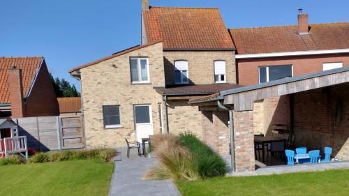 Reninge House | Up de platse