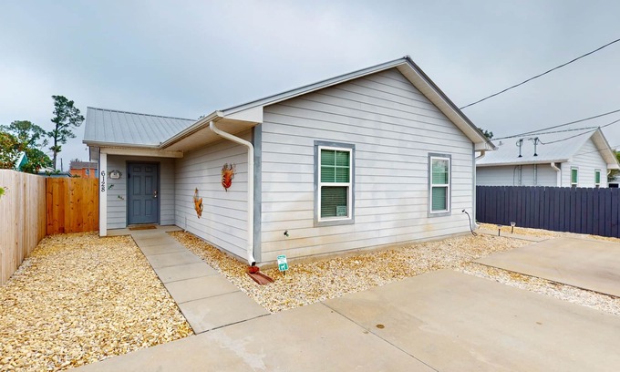 Treasure Cove House | Updated duplex with private yard, patio, updated interior, & great location