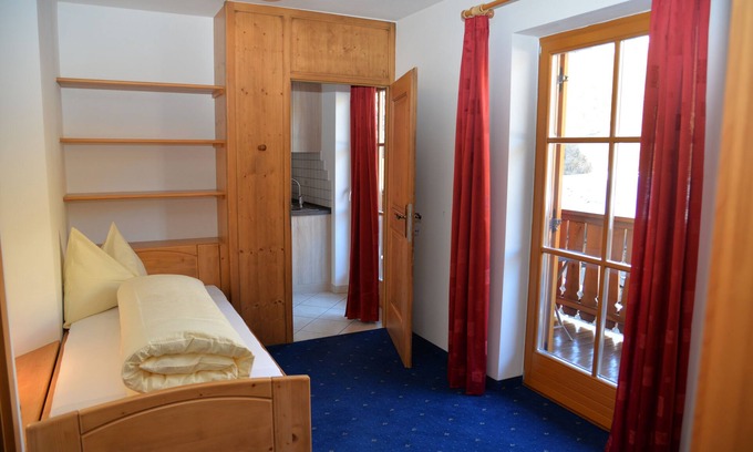 Nova Ponente Apartment | Vacation apartment "Dorfblick" with large balcony, morning sun, quiet location, pure nature