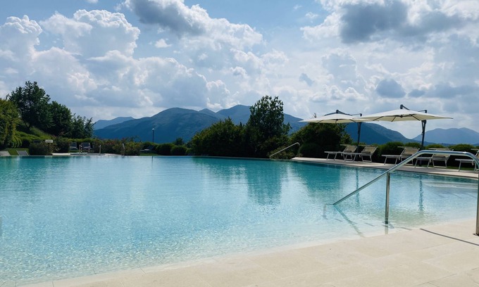 Agra Apartment | View apartment in the five-star Resort Collina d'Oro with access to the SPA.