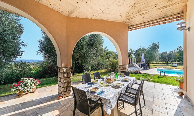 Soiano del Lago Villa | Villa Daniela con piscina vista lago by Wonderful Italy
